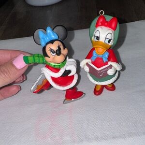 Vintage 1990s Grolier Disney Minnie and Daisy Christmas ornaments.